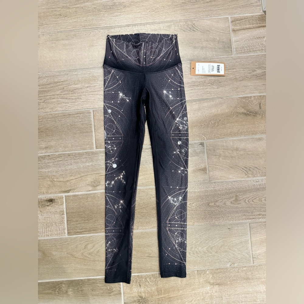 Niyama Sol barefoot leggings Orbit size small NWT